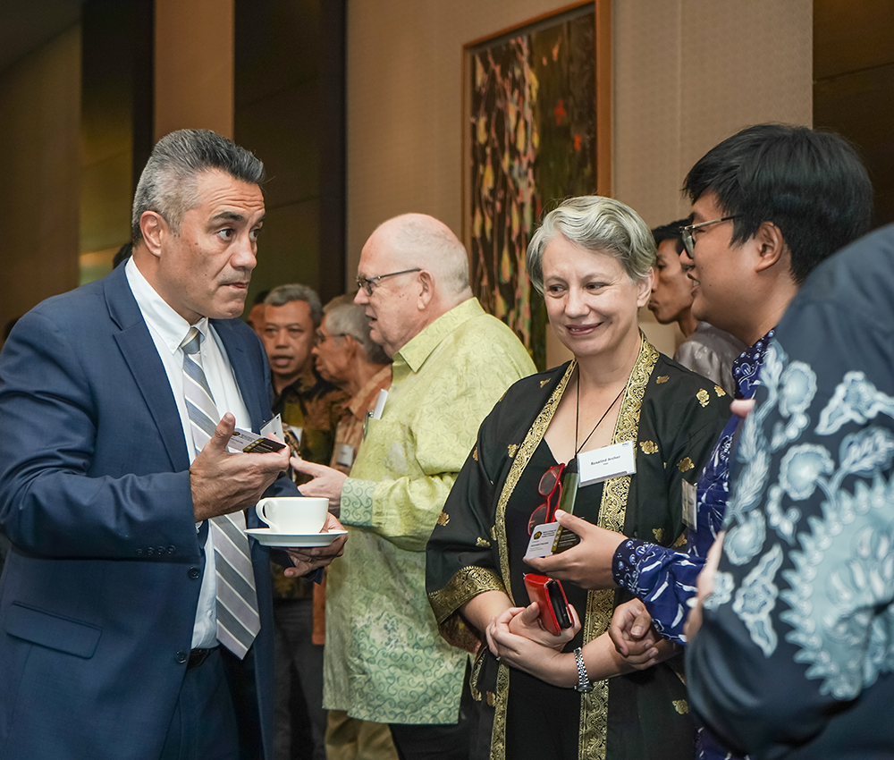 Attendees networking at event